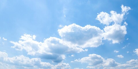 Naklejka na ściany i meble Freundlicher Wolken-Mix am blauen Himmel mit weißen Cumulus-Wolken