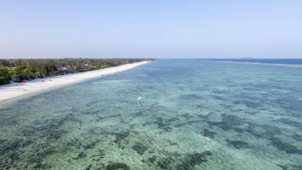 Fototapeta na wymiar Zanzibar from Above: A Stunning Drone Shot of the Exotic Beach, Palm Trees, and Ocean