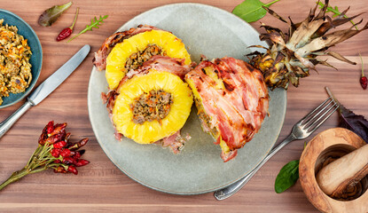 Pineapple fried with meat,wrapped bacon