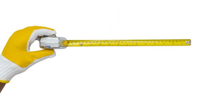 man wearing glove holding tape measure on a white background