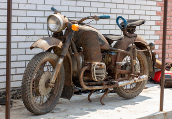 Old rusty retro motorcycle. Bike for restoration.