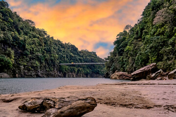 sunset over the Umngot river Meghalaya, India