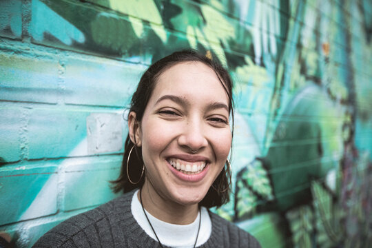 Multi Ethnic Woman With  Toothy Smile.