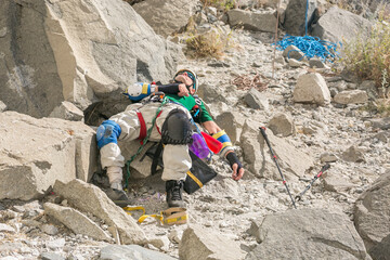 Adaptive climber Wayne Willoughby rests before a bigwall speed climb