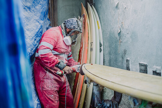 A local surf shaper from Tenerife working on a new surfboard