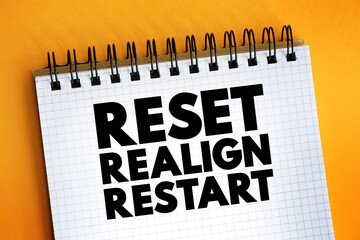 Reset Realign Restart text on notepad, concept background