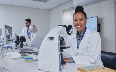 Black woman, microscope and portrait of scientist in laboratory for research, experiment or...