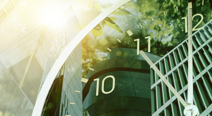 Time related concepts. Multiple exposure of clock, office buildings and trees
