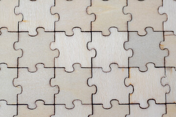 Puzzle pieces grid, jigsaw puzzle beige wood, success mosaic solution template, horizontal. Blank assembled puzzles with copy space.
