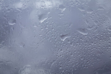 Drops of rain on glass