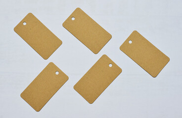 Background with cardboard labels, with spaces for text or numbers.