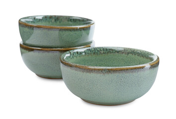Beautiful green ceramic bowls on white background
