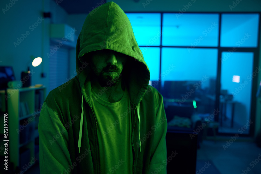 Poster man, hacking or dark hoodie in neon living room with cybersecurity, software programming or phishing