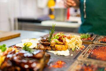 Professional chef cooking food in the kitchen restaurant