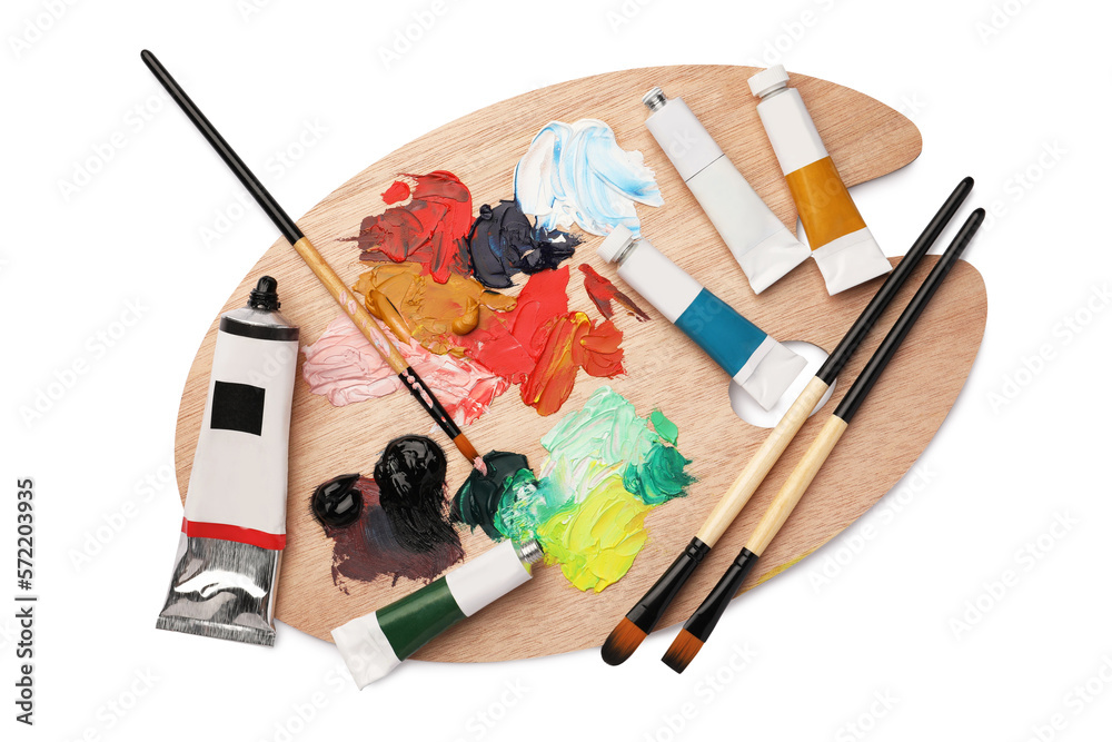 Wall mural wooden palette with oil paints and brushes on white background, top view