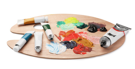 Wooden palette with oil paints on white background