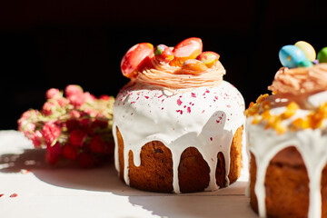 Easter cake with chocolate eggs decoration, on white wooden table the holiday, Happy Easter Holiday.