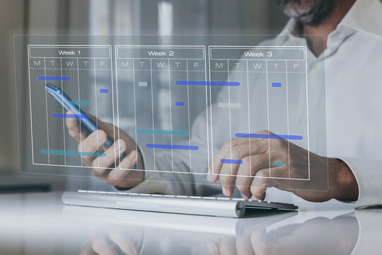Businessman use calendar for appointments and organize agenda. Planning events on virtual screen.