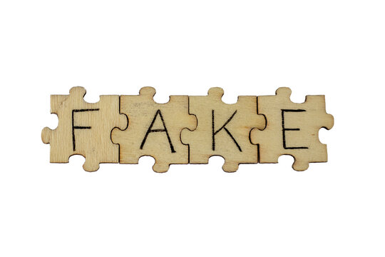 Learning FAKE. The hand lettering on the wooden puzzles is insulated on a transparent background. Png
