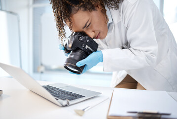 Black woman, forensic investigation and camera for laptop, it and cyber crime evidence on lab desk. Young technician, photography or computer for digital analysis of online criminal for cybersecurity - obrazy, fototapety, plakaty