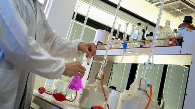 Chemical laboratory - technician at work performing an instrumental test