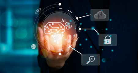 Businessman hand holding glowing digital ai and brain icon. artificial intelligence technology background concept.
