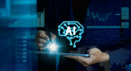 Businessman hand using pen mouse on tablet with glowing digital ai brian icon and graph on background. artificial intelligence technology concept.