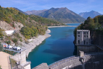 Hydro power plant on lake in French alps