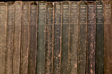 old books in a library shelf