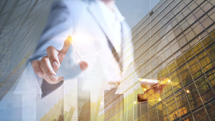 Unfamiliar businessman with clipboard working with graphs and business interface in modern city stock market concept, growth, profit, compact double exposure