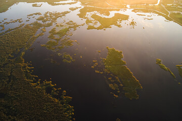 Sunrise over Comana Natural Park. Aerial view of this beautiful natural park with lakes birds and...