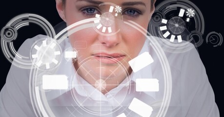 Multiple round scanners against portrait of caucasian woman against black background