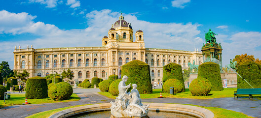 Vienna, Austria - Panoramic over memorial monument of Maria Theresa at Museums quartier between Art and Nature History museums, with statues, fountains and garden in Vienna downtown