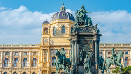 Fototapeta premium Vienna, Austria - Memorial monument of Maria Theresa at Museums quartier between Art and Nature History museums, with statues, fountains and garden in Vienna historical downtown