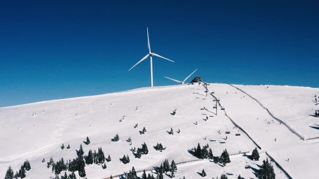 Sustainable energy, windmills creating electricity with wind turbines