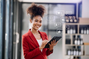woman typing smartphone, keyboard  with laptop computer of Social media and Marketing virtual icons screen concept.