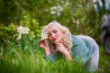 beautiful girl in the country with tulips