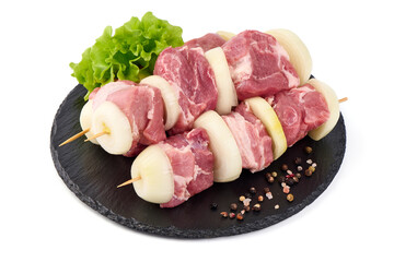 Raw pork skewers, ready to cook, BBQ, isolated on white background.