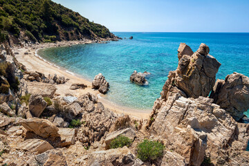 View on beach with crystal clear sea water and phenomenal rocks. Greece, Halkidiki, Athos...