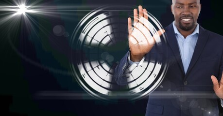 Composition of smiling businessman touching screen with scope scanning