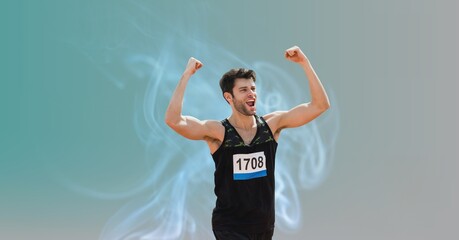 Composition of smiling fit caucasian male athlete celebrating win with copy space