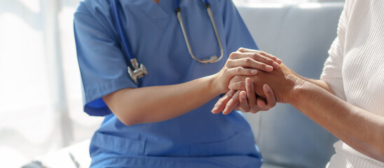 Young asian caretaker with 60s asia elderly woman consulting and encourage, take a history and...