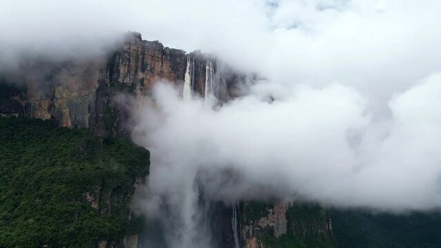 Aerial view of Angel Falls waterfall in cloudy weather. The tallest uninterrupted waterfall in the world. Canaima National Park, Venezuela. High quality 4k footage