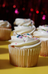 Cupcakes on Table at Party With Bokeh Background