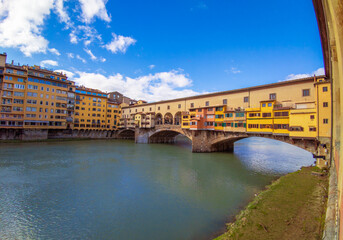 Obraz premium Firenze (Italy) - A view of artistic historical center of Florence, the capital of Renaissance culture and Tuscany region, with Ponte Vecchio and landscape from Piazzale Michelangelo square