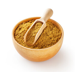 Dry turmeric (curcuma) powder in wooden bowl with scoop isolated on white background with clipping path