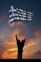 Father with son and the flag of Greece