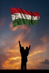 Father with son and the flag of Hungary