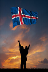 Father with son and the flag of Iceland