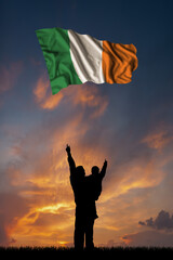 Father with son and the flag of Ireland
